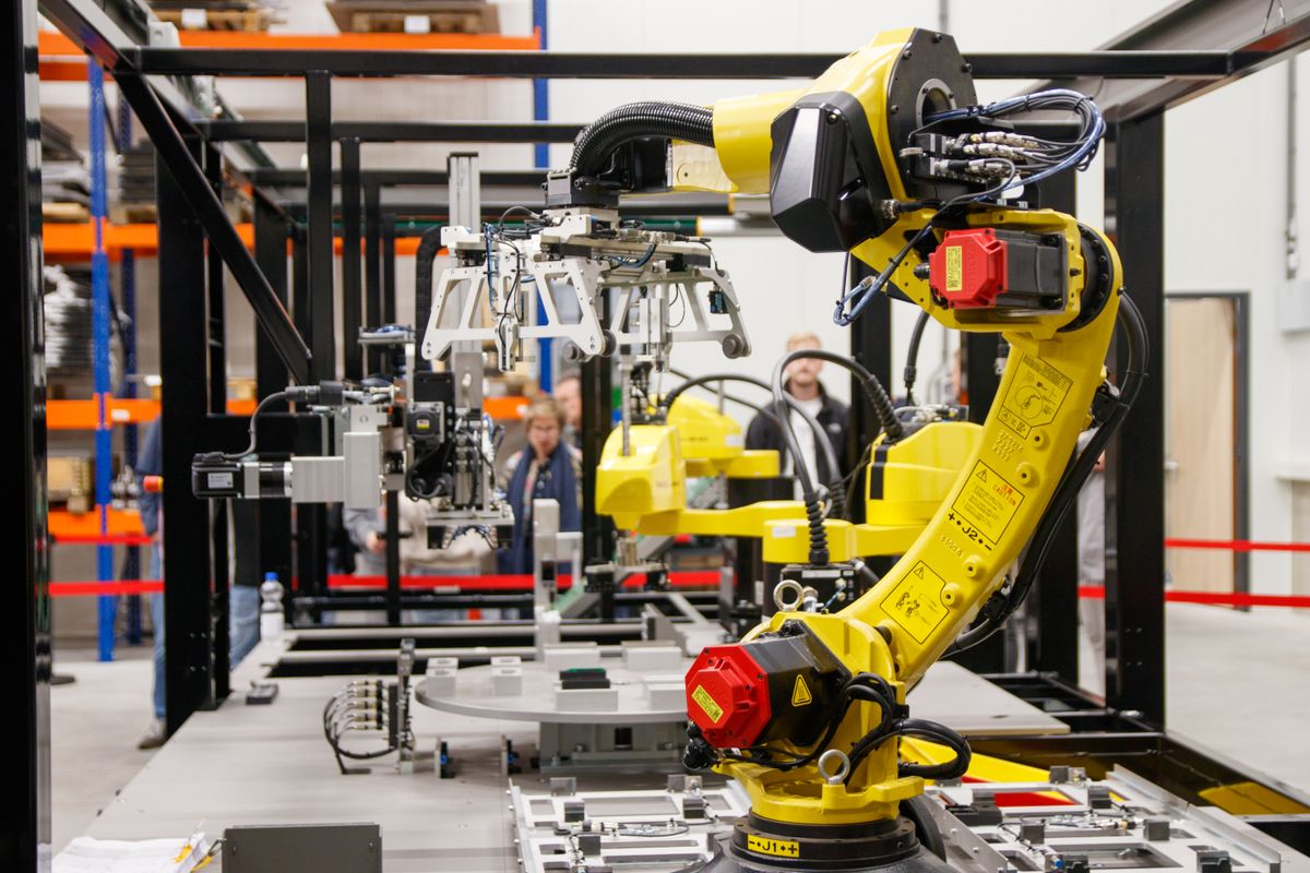 Industrial robot arm on an automotive production line