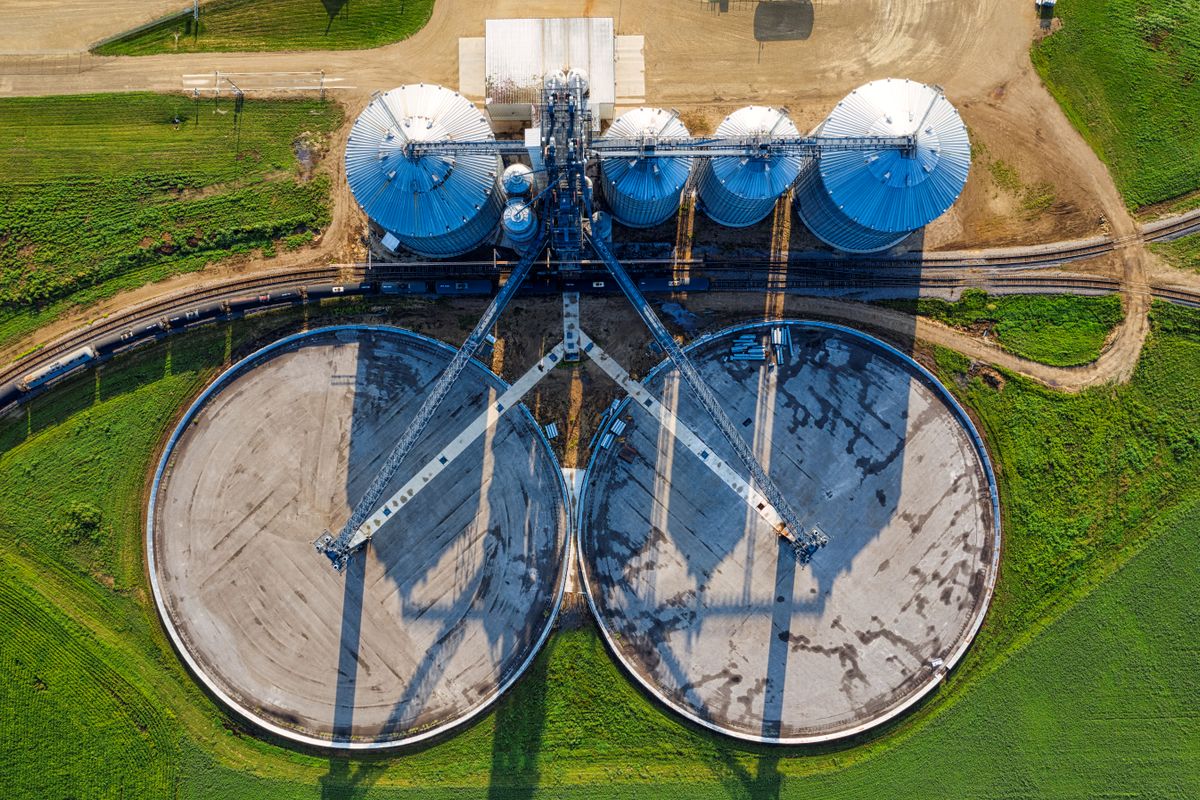 Aerial view of water treatment infrastructure with circular basins