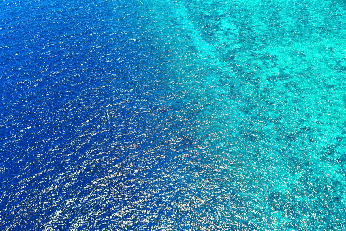 Aerial view of clear blue seawater
